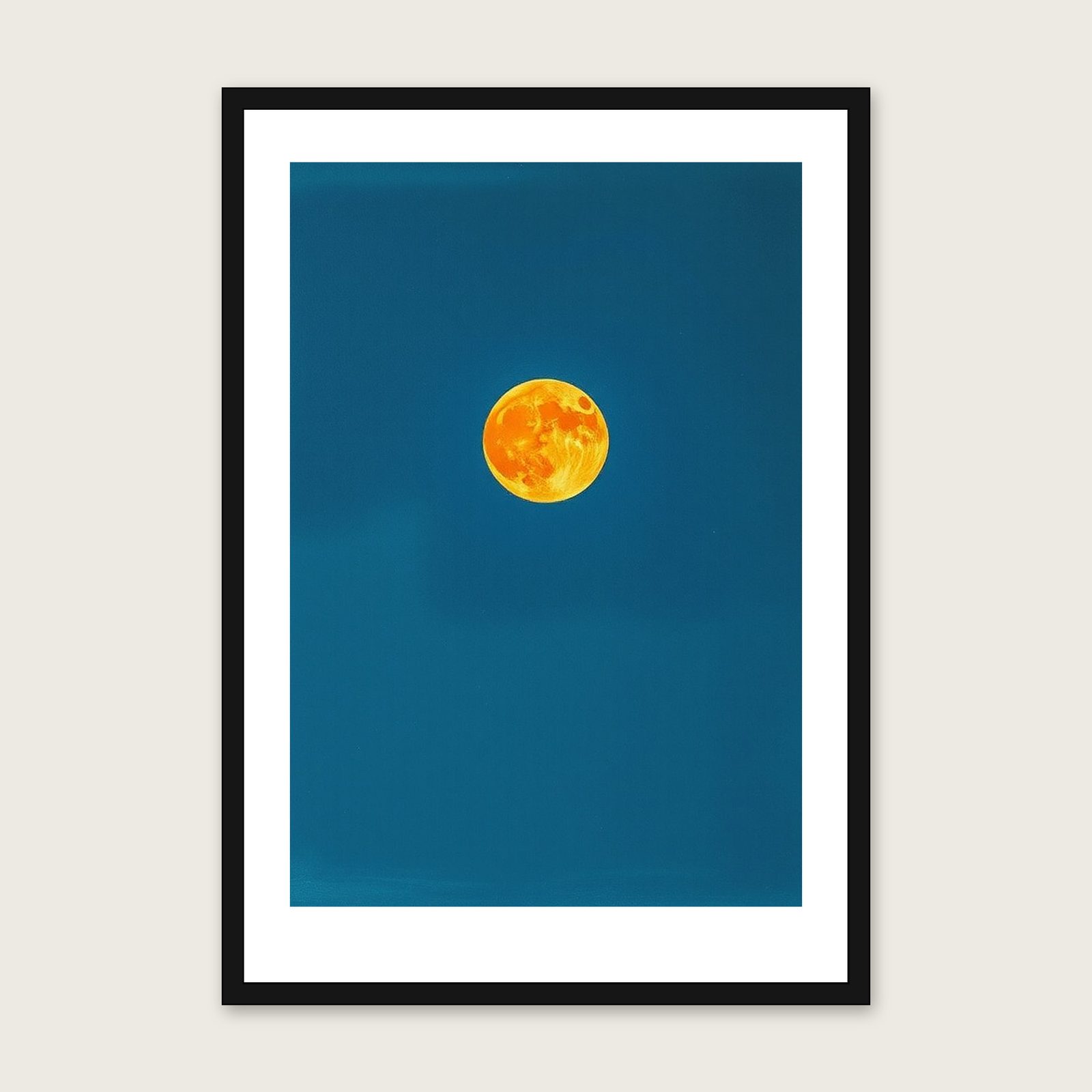 A Harvest Moon Celestial Wall Art - Framed Bold Colour Pastel Print shown in a black frame